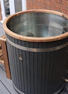 Modern cold plunge barrel tub for home recovery and ice bath training